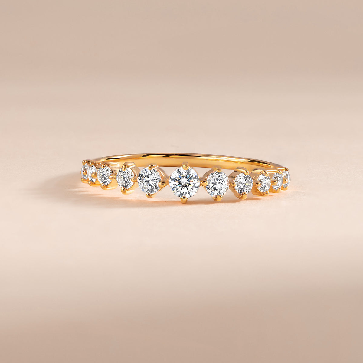 Nerissa Yellow Gold Graduated Moissanite Band