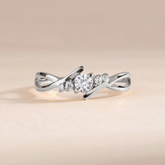 Dainty 18k White Gold Diamond Twisted Engagement Ring